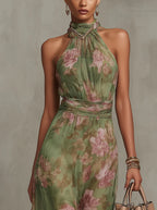 SERENA | VESTIDO LARGO DE GASA VERDE CON ESTAMPADO FLORAL Y ESCOTE HALTER