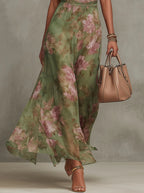 SERENA | VESTIDO LARGO DE GASA VERDE CON ESTAMPADO FLORAL Y ESCOTE HALTER