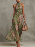 SERENA | VESTIDO LARGO DE GASA VERDE CON ESTAMPADO FLORAL Y ESCOTE HALTER