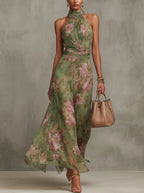 SERENA | VESTIDO LARGO DE GASA VERDE CON ESTAMPADO FLORAL Y ESCOTE HALTER