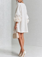 BRUNA | MINIVESTIDO CON BOTONES Y MANGAS FLORALES EXTRAVAGANTES
