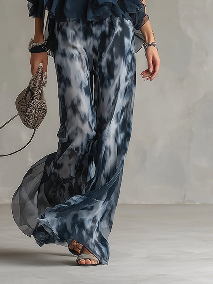 ANABEL | ELEGANTE VESTIDO DE GASA CON CORPIÑO DE CUELLO ALTO Y PANTALON ANCHO ESTAMPADO